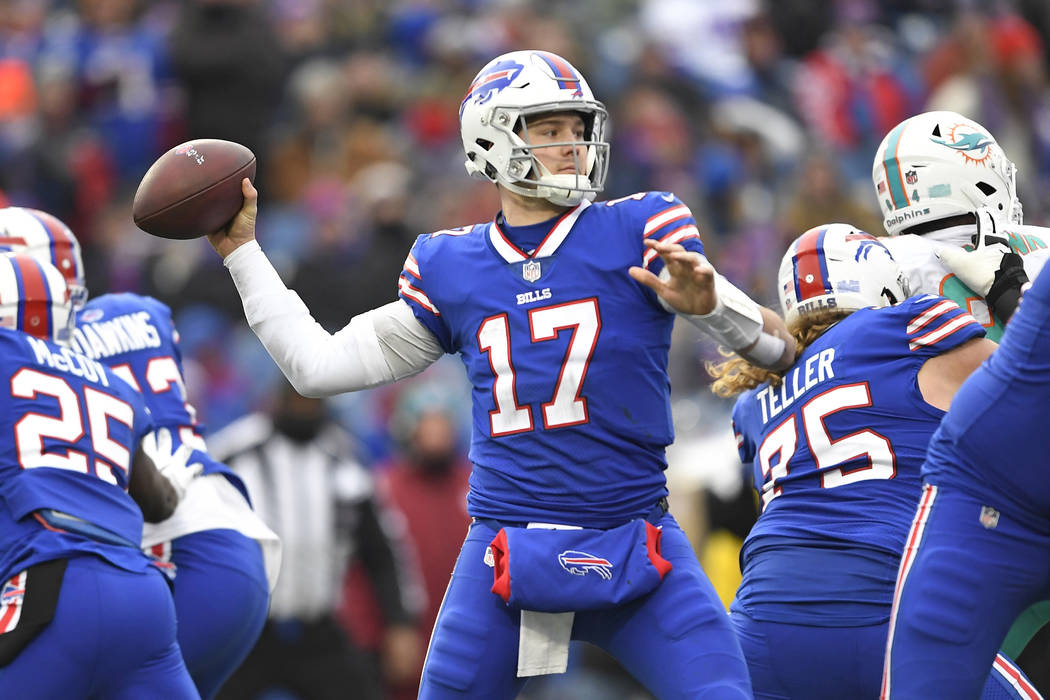 Buffalo Bills quarterback Josh Allen (17) throws during the second half of an NFL football game ...