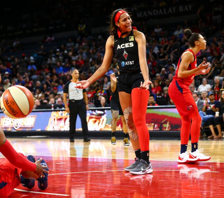 Las Vegas Aces center A'ja Wilson (22) reacts after getting fouled by a Washington Mystics play ...