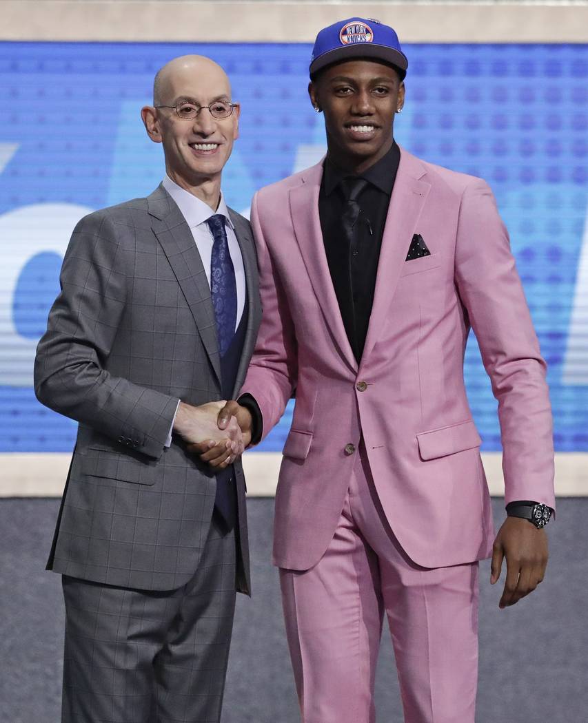 Duke's RJ Barrett poses for photographs with NBA Commissioner Adam Silver after being selected ...
