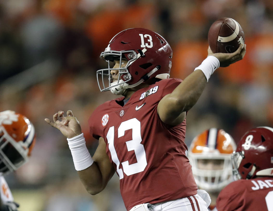 Alabama's Tua Tagovailoa throws during the first half the NCAA college football playoff champio ...