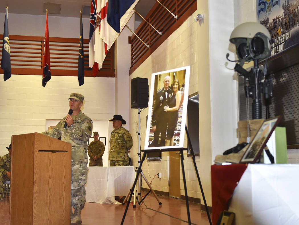 Nevada Army Guard chaplain Capt. Troy Dandrea delivers a memorial message during a ceremony for ...