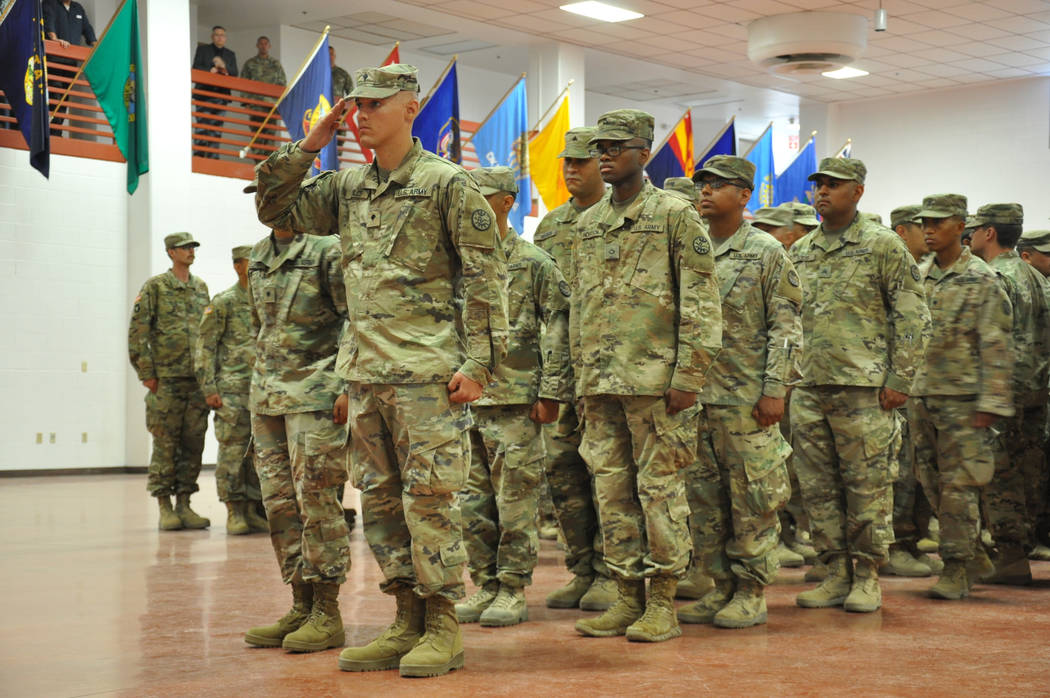Soldiers from the Nevada Army Guard's 1st Squadron 221st Calvary pay their final respects ...
