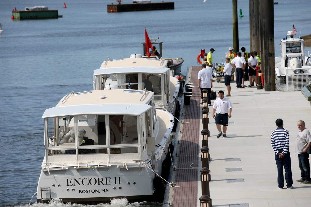 Luxury harbor shuttles on the Mystic River at Encore Boston Harbor in Everett, Mass., Saturday, ...