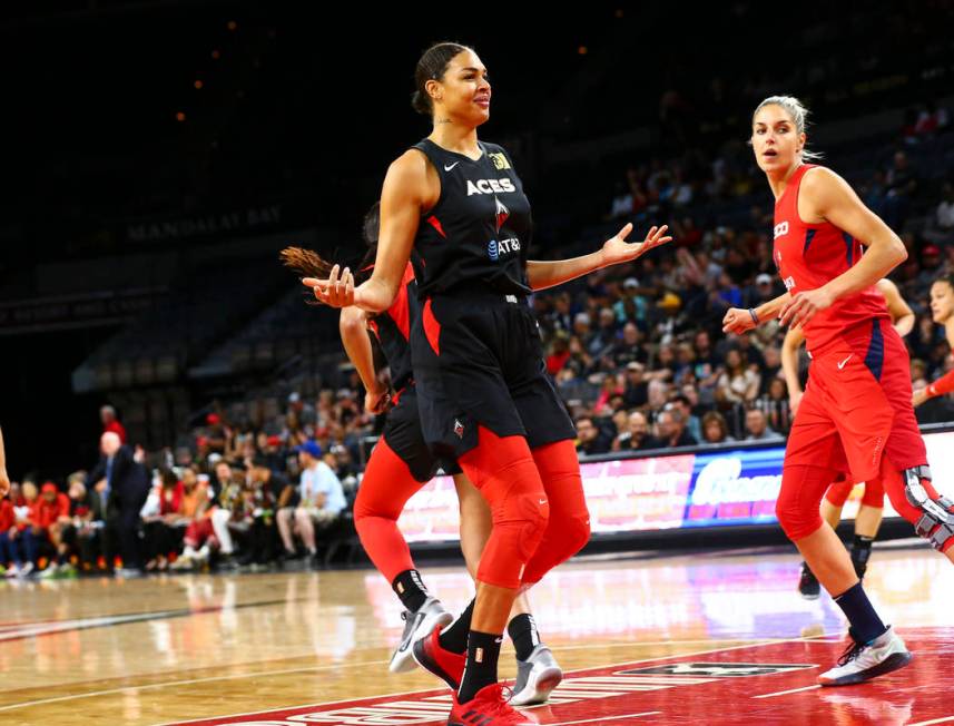 Las Vegas Aces center Liz Cambage (8) reacts after scoring against the Washington Mystics durin ...