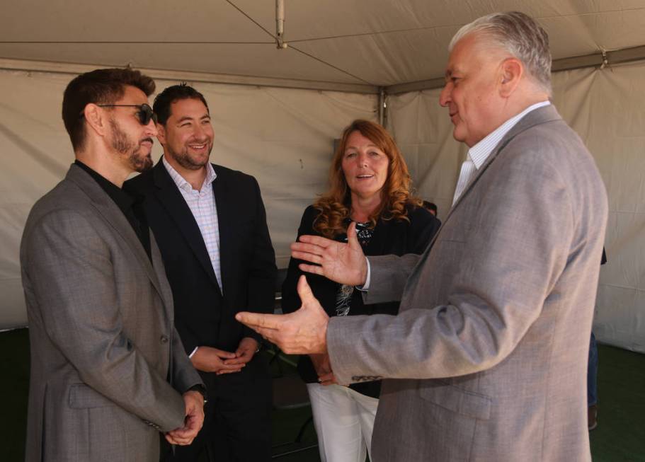 (From Left to Right) Rob Roy, CEO of Switch, Clark County Commissioner Mike Naft, Commissioner ...