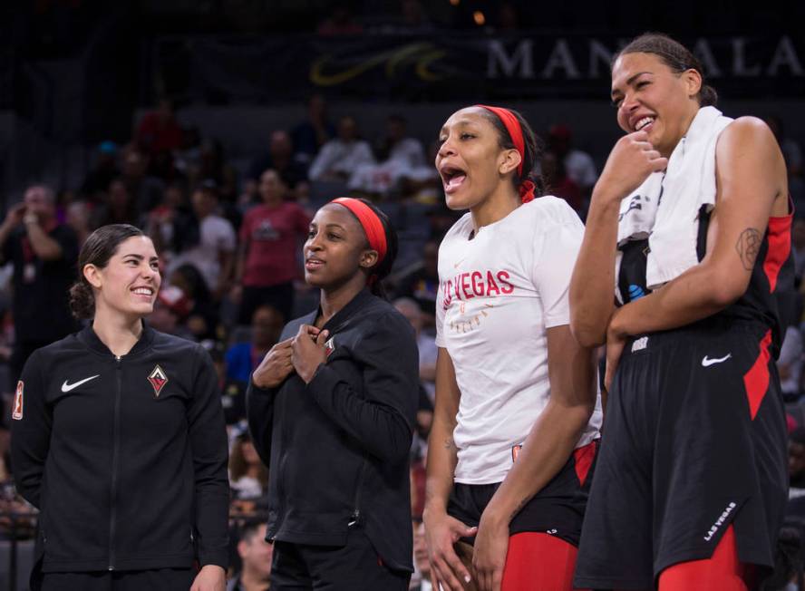 Las Vegas Aces guard Kelsey Plum (10), Las Vegas Aces guard Jackie Young (0), Las Vegas Aces ce ...