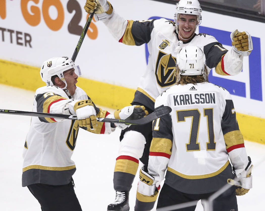 Golden Knights right wing Reilly Smith (19) and center Jonathan Marchessault (81) celebrate a g ...