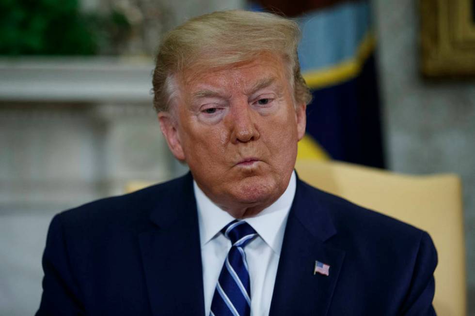 President Donald Trump listens to a question during a meeting with Canadian Prime Minister Just ...