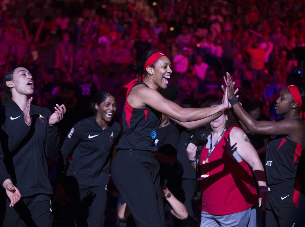 Las Vegas Aces center A'ja Wilson (22) is announced before the start of Vegas' WNBA game with t ...