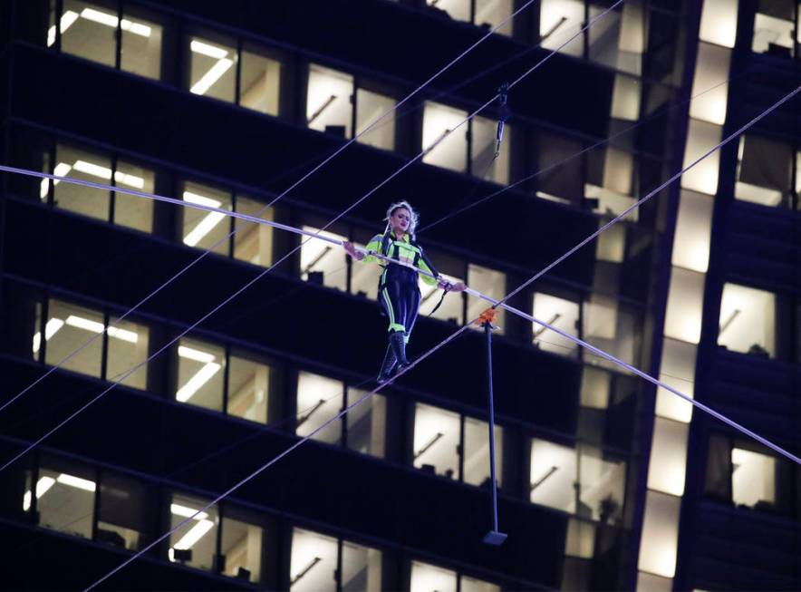 Aerialist Lijana Wallenda walks on a high wire above Times Square, Sunday, June 23, 2019, in Ne ...