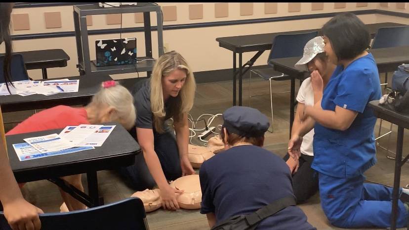 Leslie Shaffer instructs attendees at the Heart Health and Hands Only CPR class at the Summerli ...