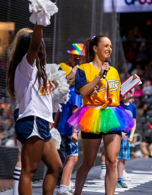 Aviators on-field emcee Katie Greener sports a rainbow tutu while working the crowd during Prid ...