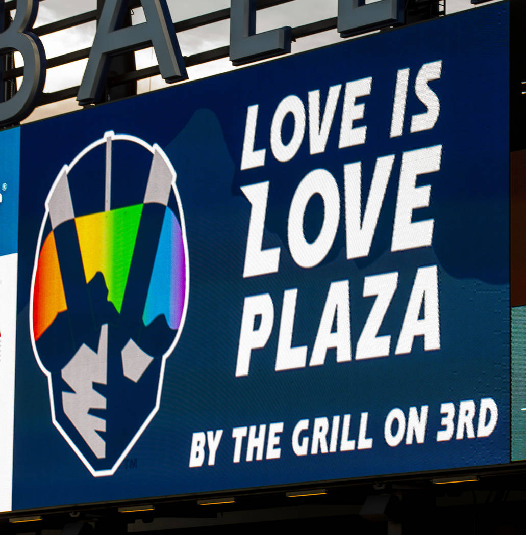 Even the Aviator logo is awash in rainbow colors on the scoreboard during Pride Night at the La ...