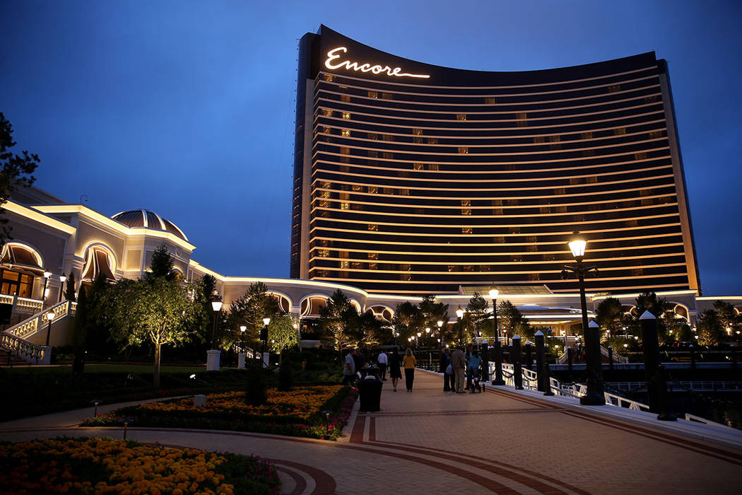 Guests take in the Mystic River during an invitation-only party at Encore Boston Harbor, June 2 ...