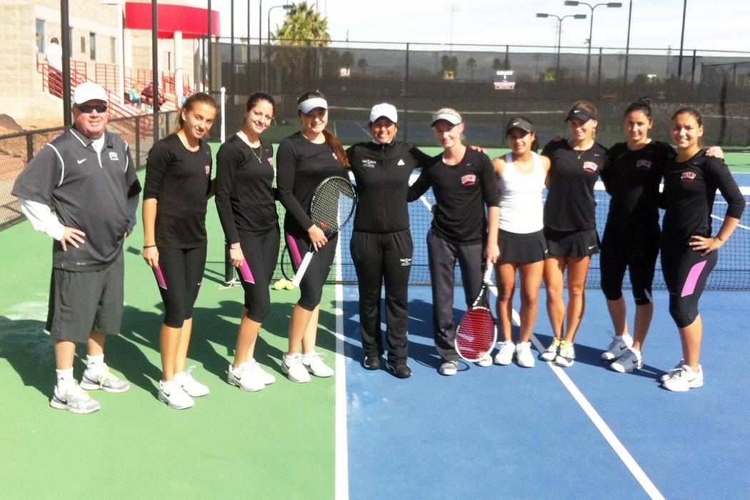 Ex-UNLV great Jolene Watanabe stands with the 2014 Rebels tennis team. (UNLV Athletics)