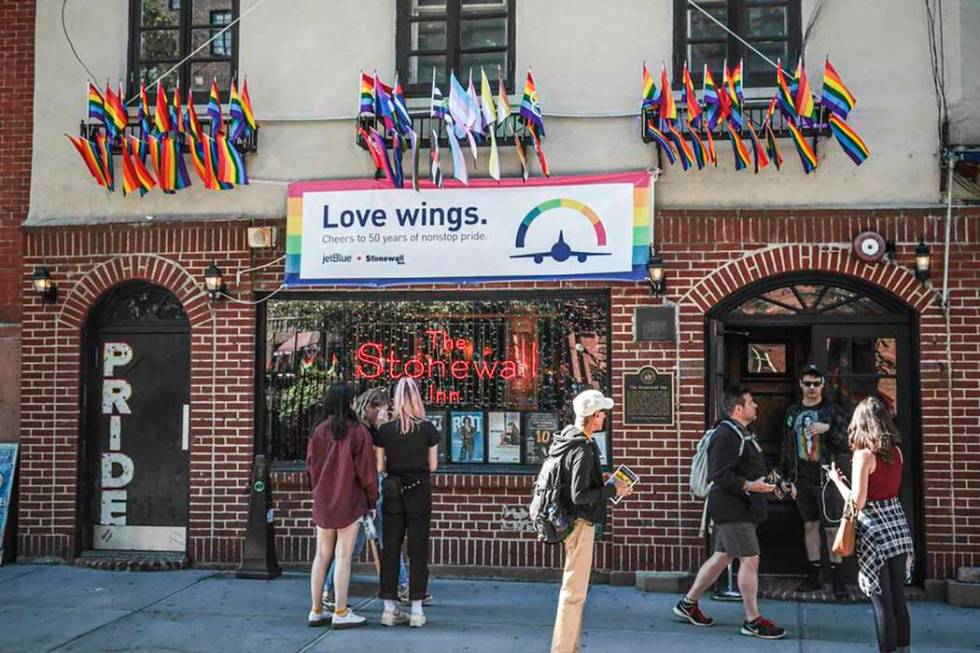 Pride flags and pride colors display on the Stonewall Inn bar on June 3, 2019, marking the sit ...