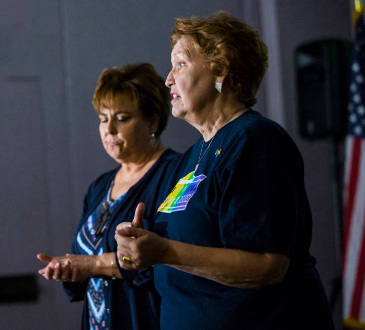 Donna West, chair of the Clark County Democratic Party, right, speaks alongside Marla Turner be ...