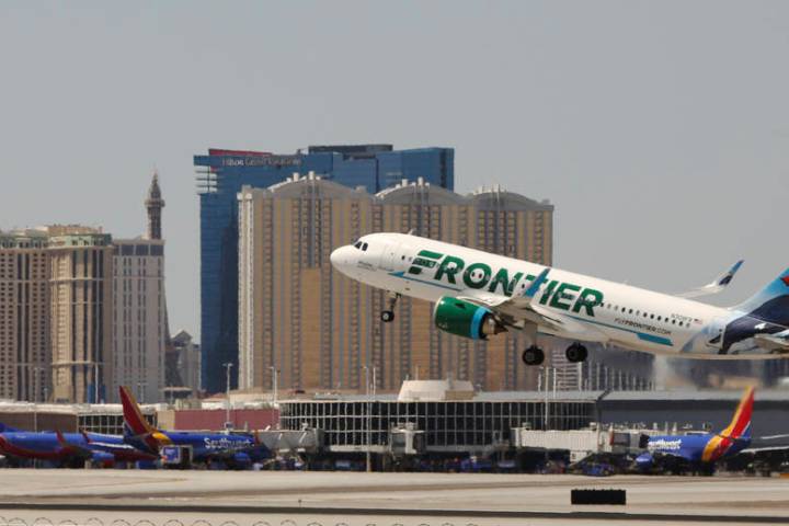 A Frontier airlines flight departs for takeoff at McCarran International Airport on Wednesday, ...