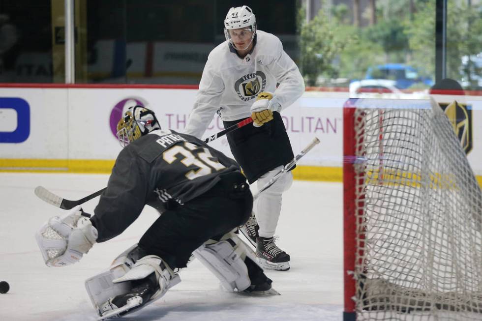 Vegas Golden Knights Ryder Donovan (47) takes a shot at goaltender Jiri Patera (32) during deve ...