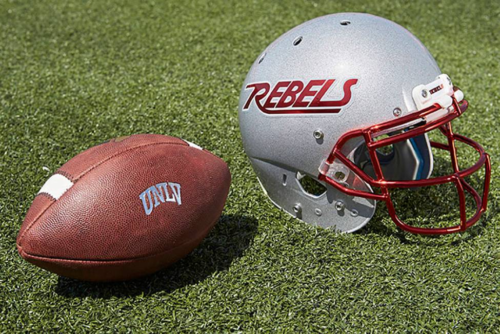 UNLV football helmet and ball (R. Marsh Starks/UNLV Creative Services)