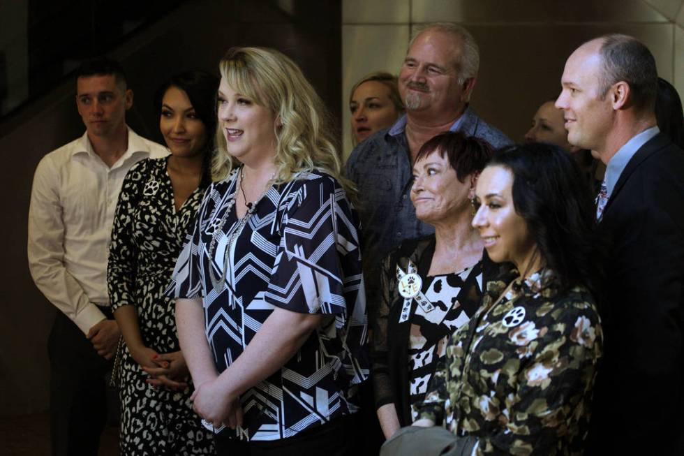 Supporters of dog trainer Ricky Allen Davis speak to reporters after Davis' hearing at Regional ...