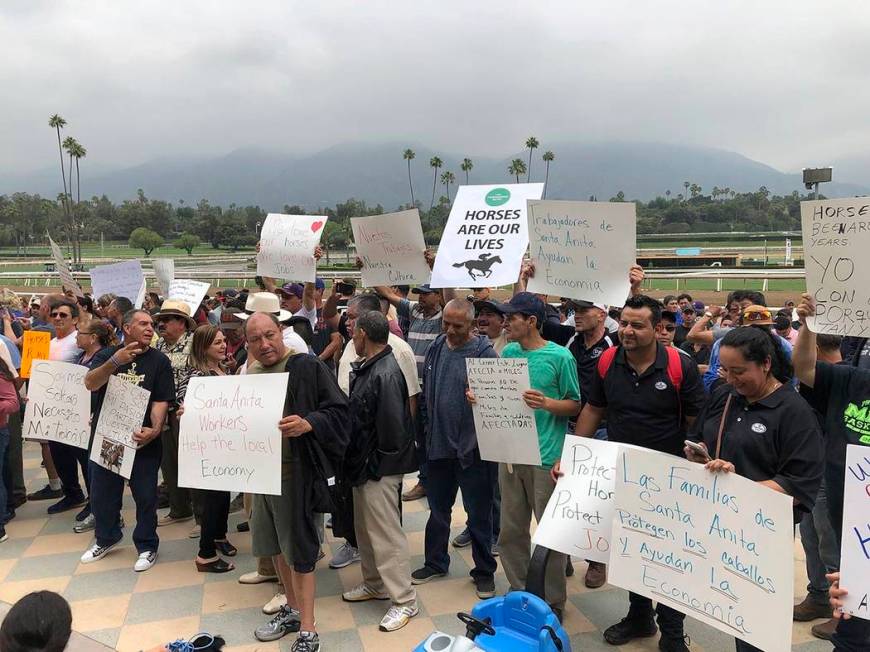 In this June 20, 2019 file photo Santa Anita Park workers hold a rally at the track in Arcadia, ...