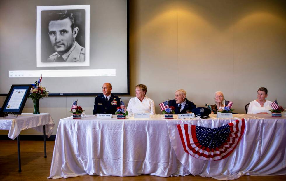 Family members, from left, Trent Arnold, Susan Parker, James "Jim" A. Parker and wife ...