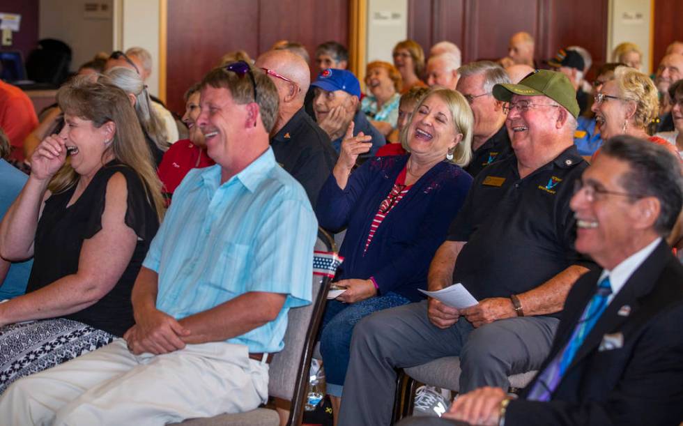 Invited guests enjoy a video as The Veterans Club of Sun City Aliante and the city of North Las ...