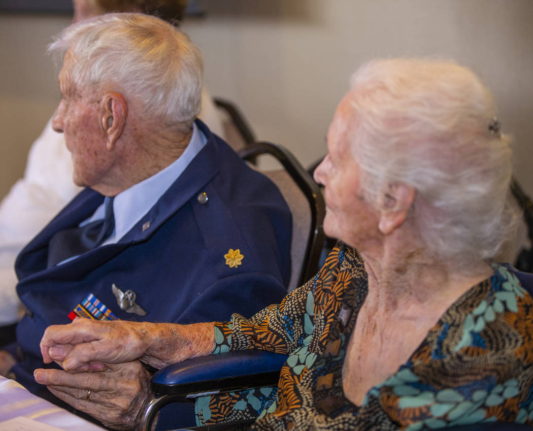 James "Jim" A. Parker and wife Joyce hold hands after 76 years of marriage as The Vet ...