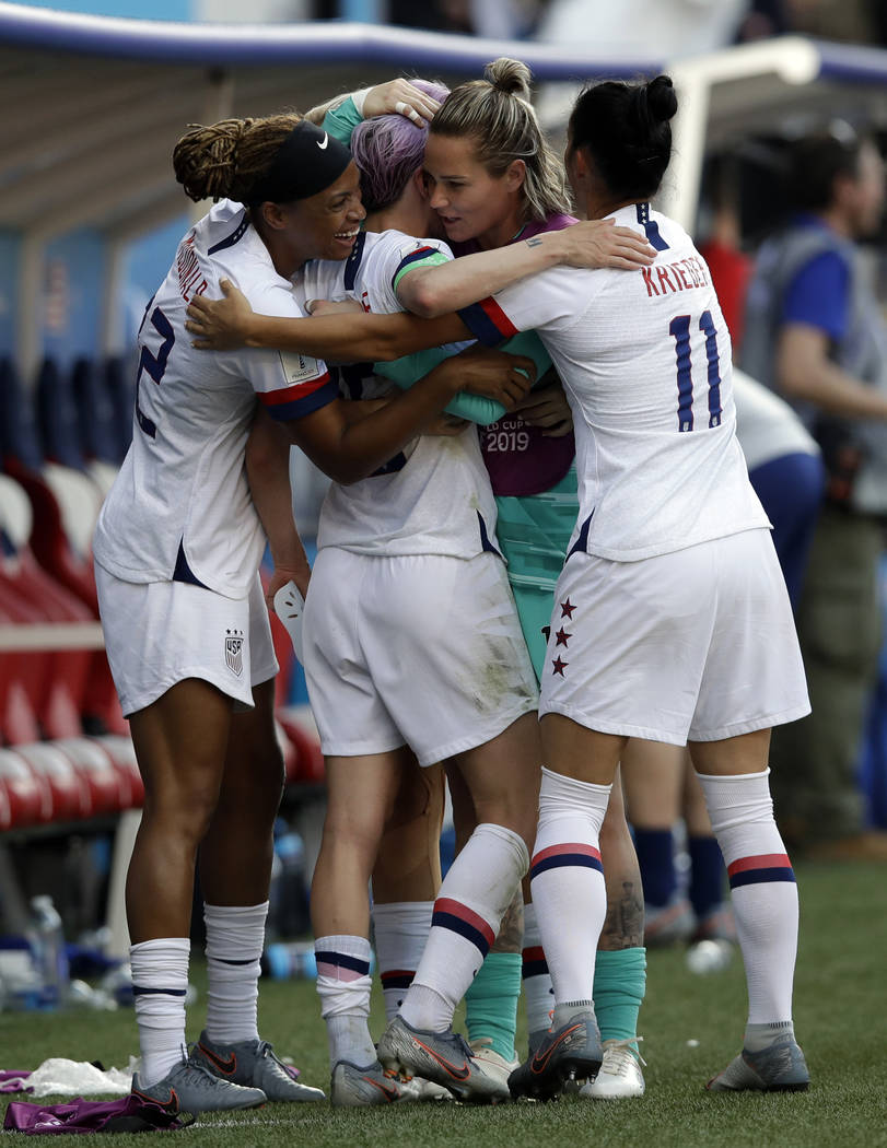 United States players celebrates at the end of the Women's World Cup round of 16 soccer match b ...