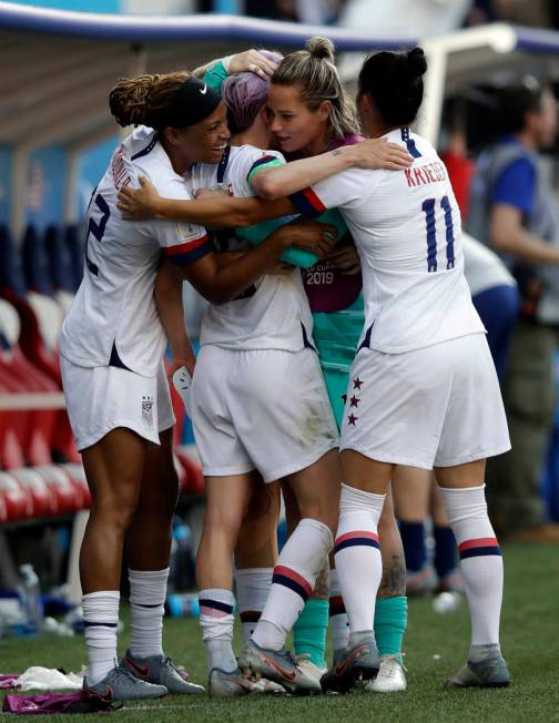United States players celebrates at the end of the Women's World Cup round of 16 soccer match b ...
