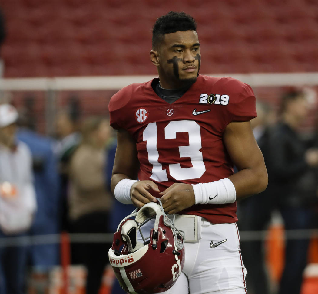 Alabama quarterback Tua Tagovailoa warms up before the NCAA college football playoff championsh ...