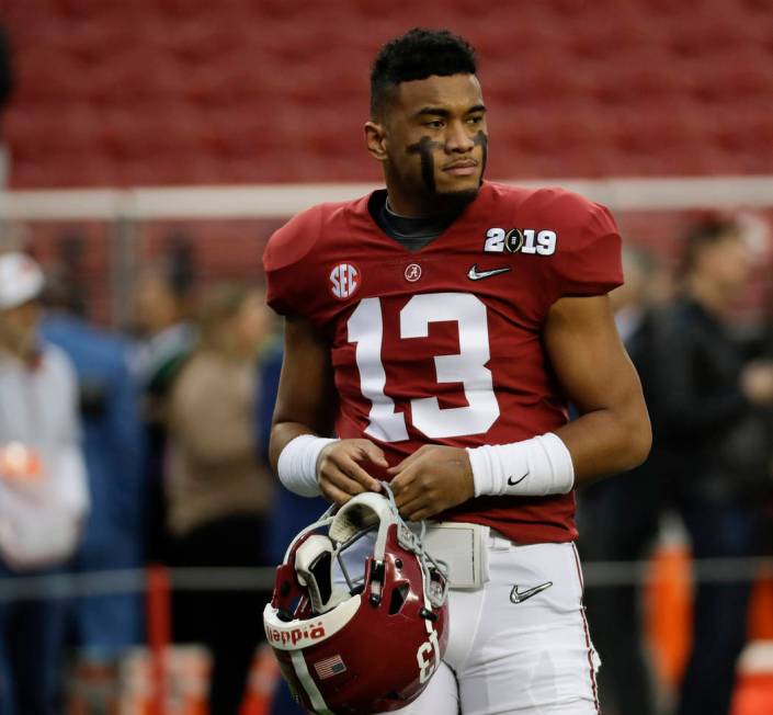 Alabama quarterback Tua Tagovailoa warms up before the NCAA college football playoff championsh ...