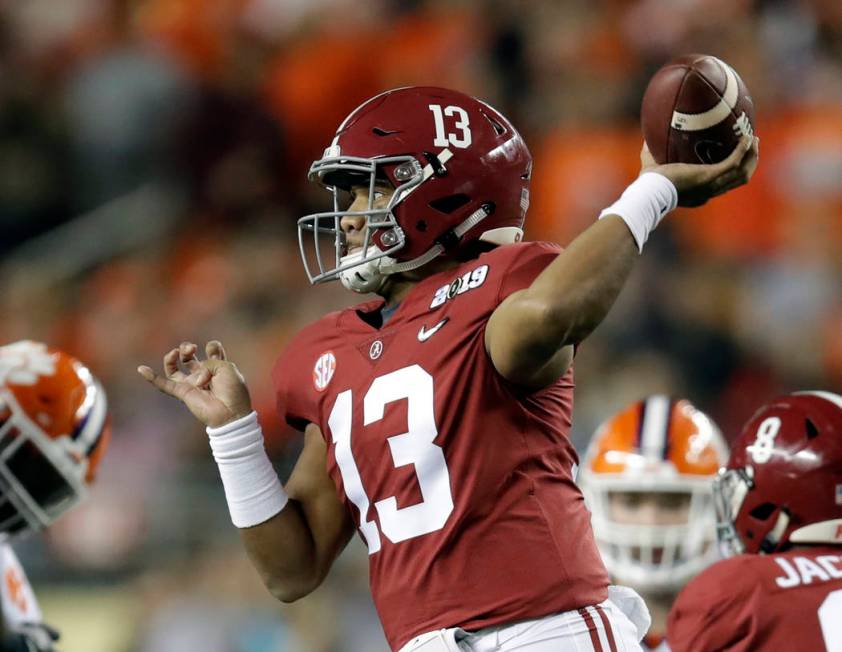 Alabama's Tua Tagovailoa throws during the first half the NCAA college football playoff champio ...