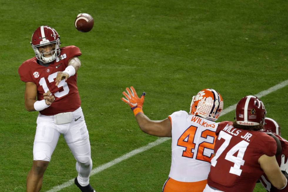 Alabama's Tua Tagovailoa throws during the first half the NCAA college football playoff champio ...