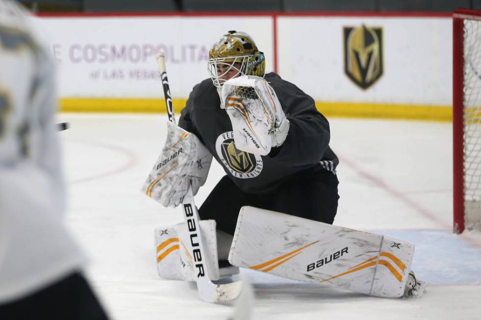 Vegas Golden Knights goaltender Jiri Patera (32) defends a shot during a development camp scrim ...