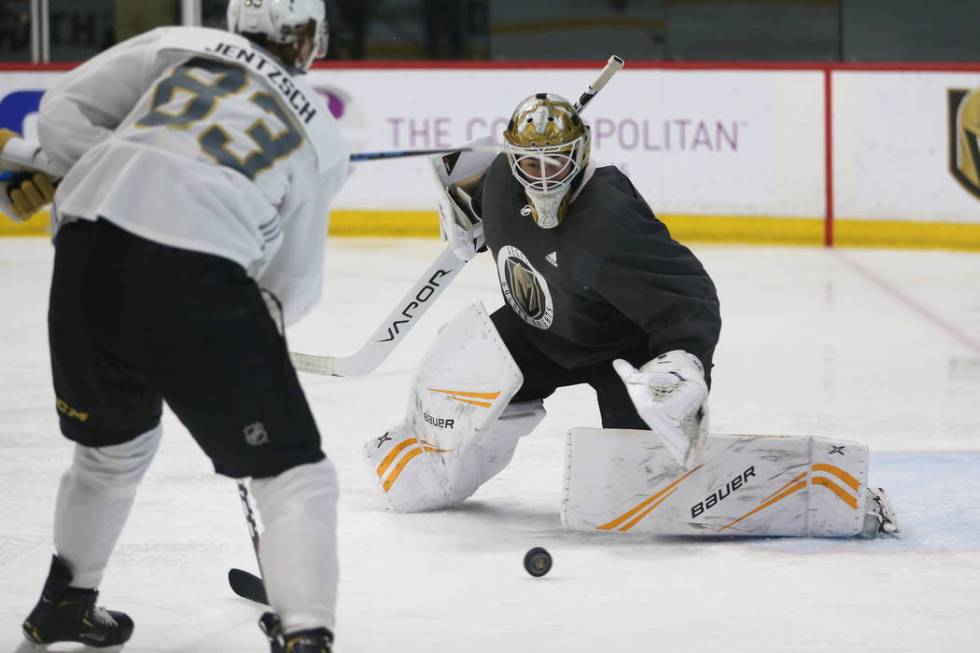 Vegas Golden Knights goaltender Jiri Patera (32) defends a shot during a development camp scrim ...