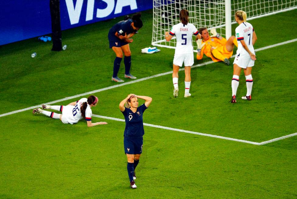 France's Eugenie Le Sommer, front, reacts after missing a chance to score during the Women's Wo ...