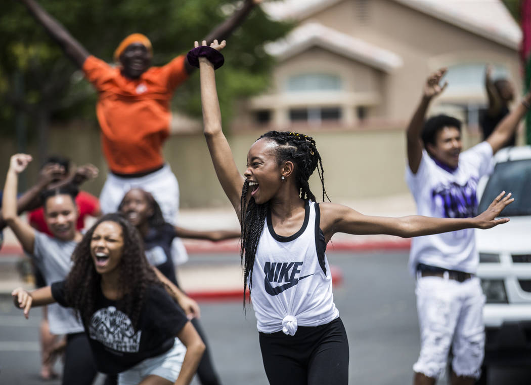 Jazmun McCoy, middle, dances with members of the West Las Vegas Arts Center Performance Ensembl ...