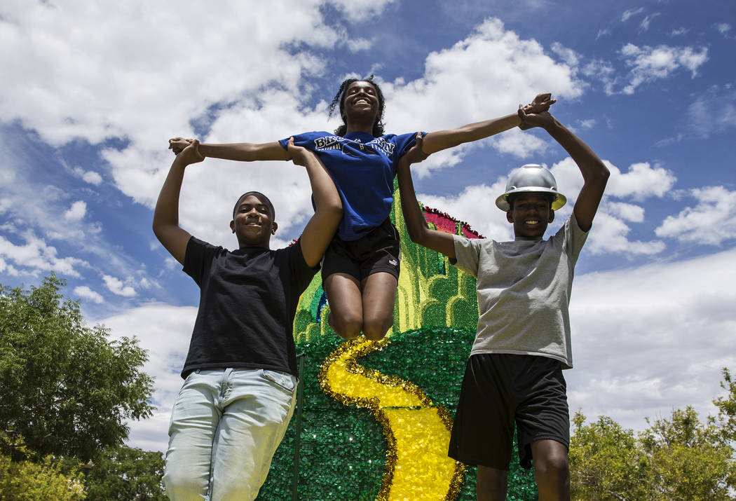 Shawn Hemphill, from left, Teshi Thomas and Malachi Moseley, members of the West Las Vegas Arts ...