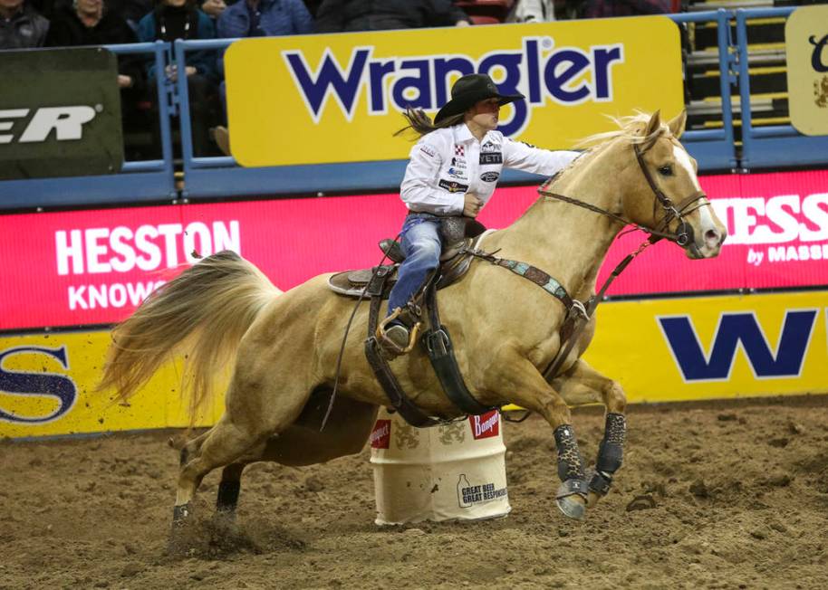 Hailey Kinsel of Cotulla, Texas (53) competes in the barrel racing event during the ninth go-ro ...