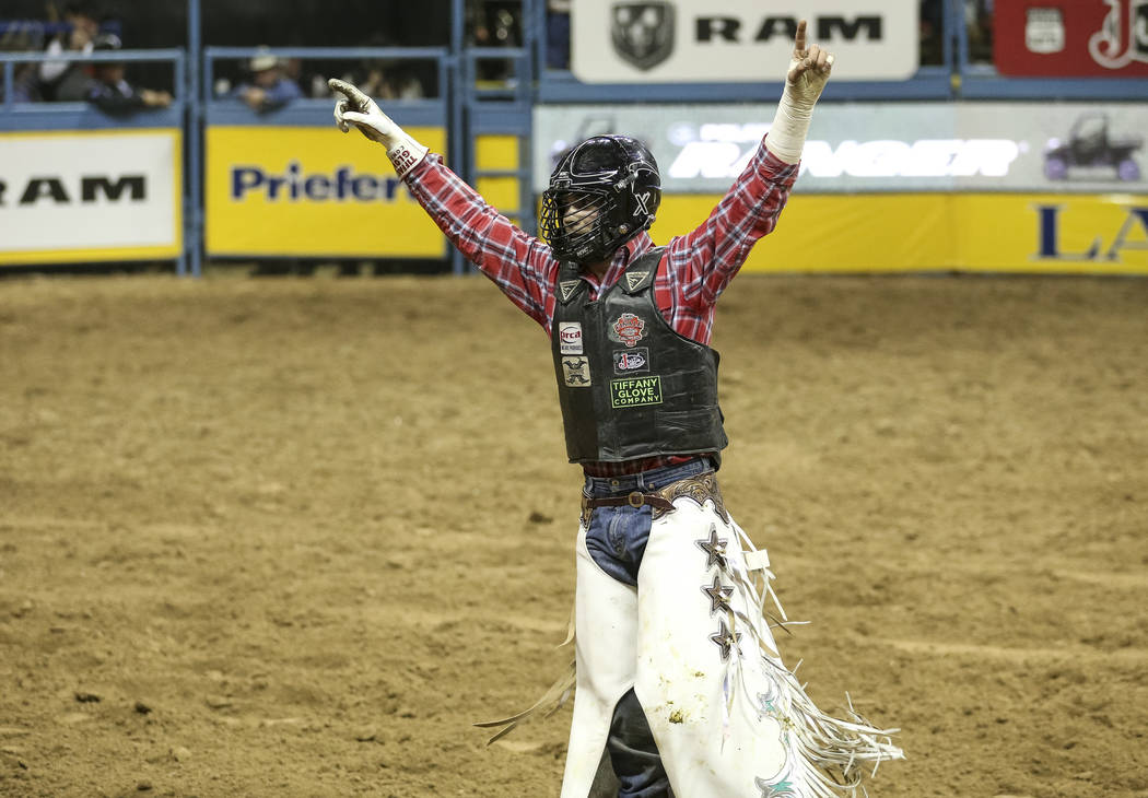 Eli Vastbinder of Union Grove, N.C. (105) reacts after competing in the bull riding event durin ...