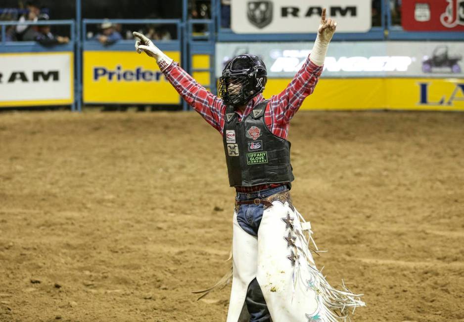 Eli Vastbinder of Union Grove, N.C. (105) reacts after competing in the bull riding event durin ...