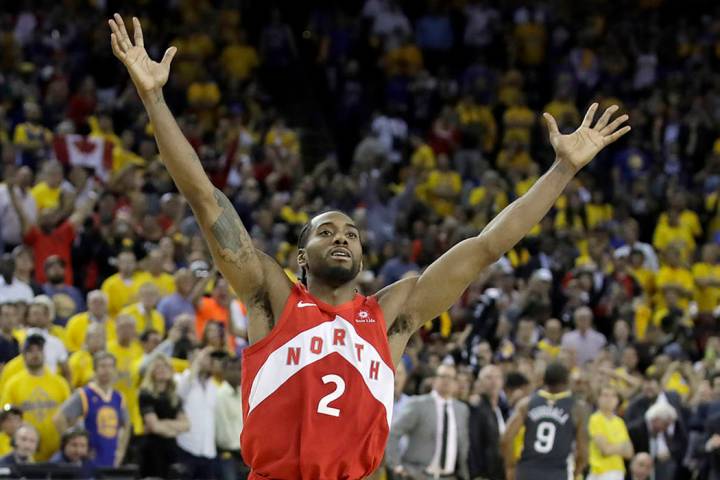 Toronto Raptors forward Kawhi Leonard celebrates after the Raptors defeated the Golden State Wa ...