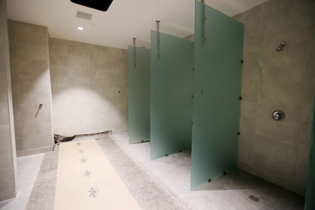 The showers for the locker room at the new UNLV Fertitta Football Complex, still under construc ...
