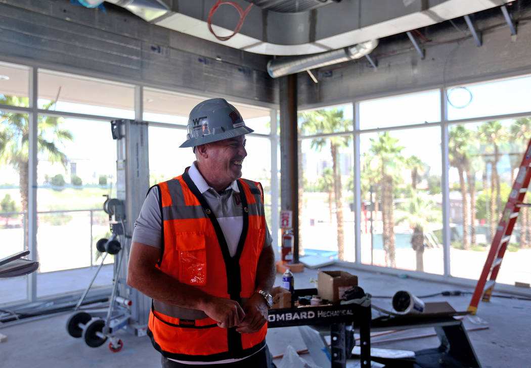 Coach Tony Sanchez leads a tour for the Review-Journal in his future office at the new UNLV Fer ...