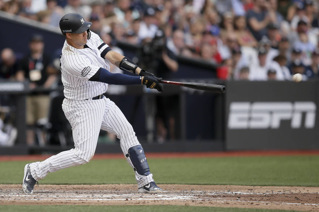 New York Yankees' Gary Sanchez hits a two-RBI single against the Boston Red Sox during the seve ...