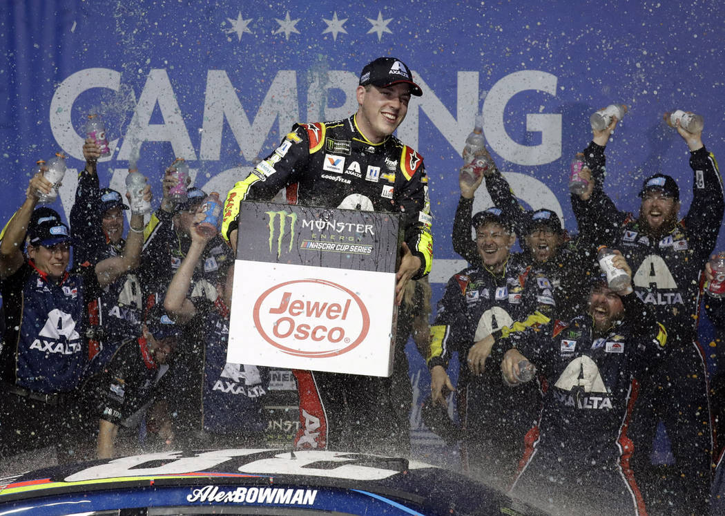 Alex Bowman celebrates after winning the NASCAR Cup Series auto race at Chicagoland Speedway in ...