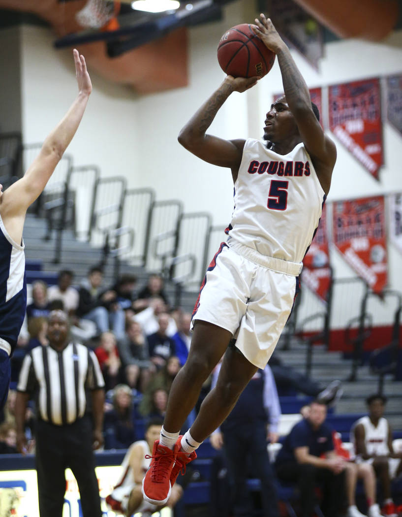 Coronado’s Eric Alston (5) shoots against Foothill during a basketball game at Coronad ...