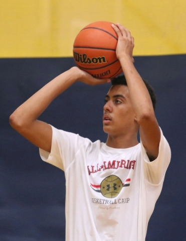 Greg Floyd Jr. lines up a shot during a Las Vegas Knicks basketball practice at Tarkanian Ba ...